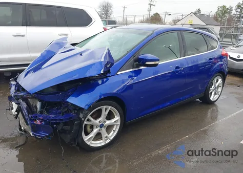 2015 Ford Focus Titanium z USA, uszkodzony, nr VIN 1FADP3N28FL268901